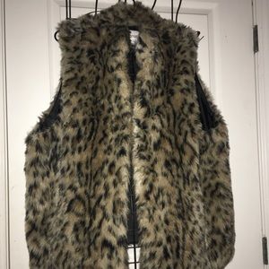 A leopard faux fur vest
